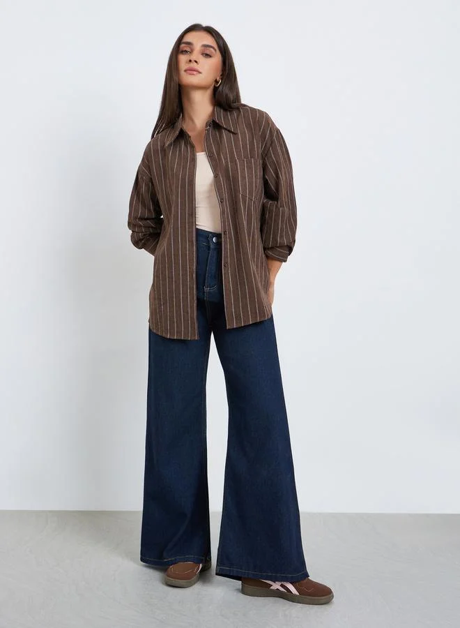 ستايلي بلوزة مخططة بقصة واسعة